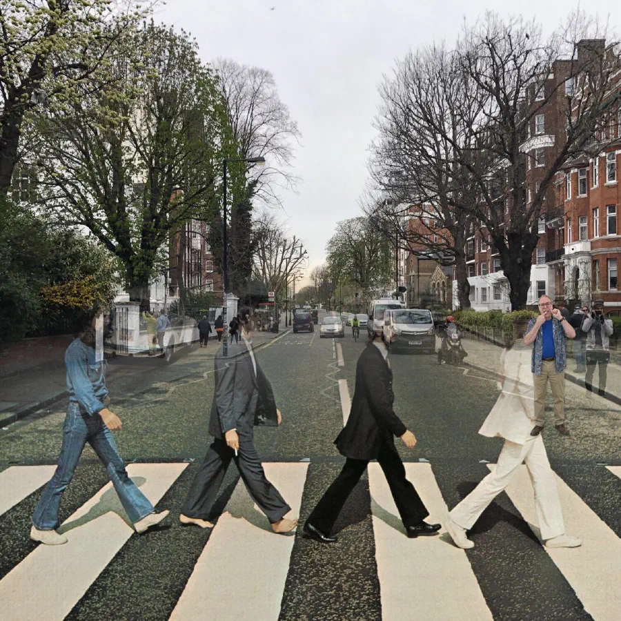 The Abbey Road zebra crossing, with Keith flossing on the right-hand sidewalk